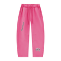 Bright pink jogger sweatpants with an elastic waistband, drawstring, side pockets, and small chrome platinum graphic prints on the legs, shown against a plain white background.