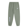 Olive green jogger sweatpants with a drawstring waist, side pockets, and vertical 'PUSH THRU IT' text printed in a holographic pink and blue gradient on the left leg, with a matching logo on the right hip.