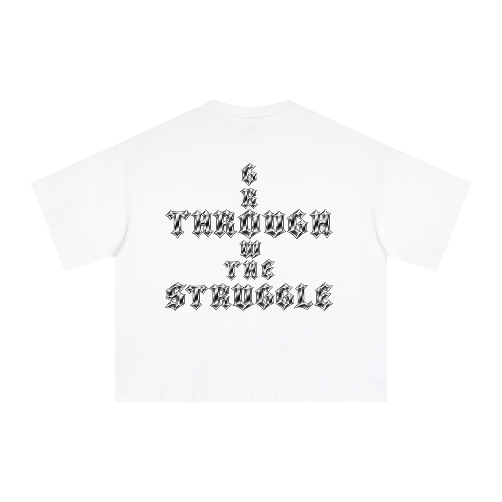 Back view of a white short-sleeve t-shirt with a pattern metallic gothic-style text graphic that reads 'PUSH THROUGH THE STRUGGLE'.